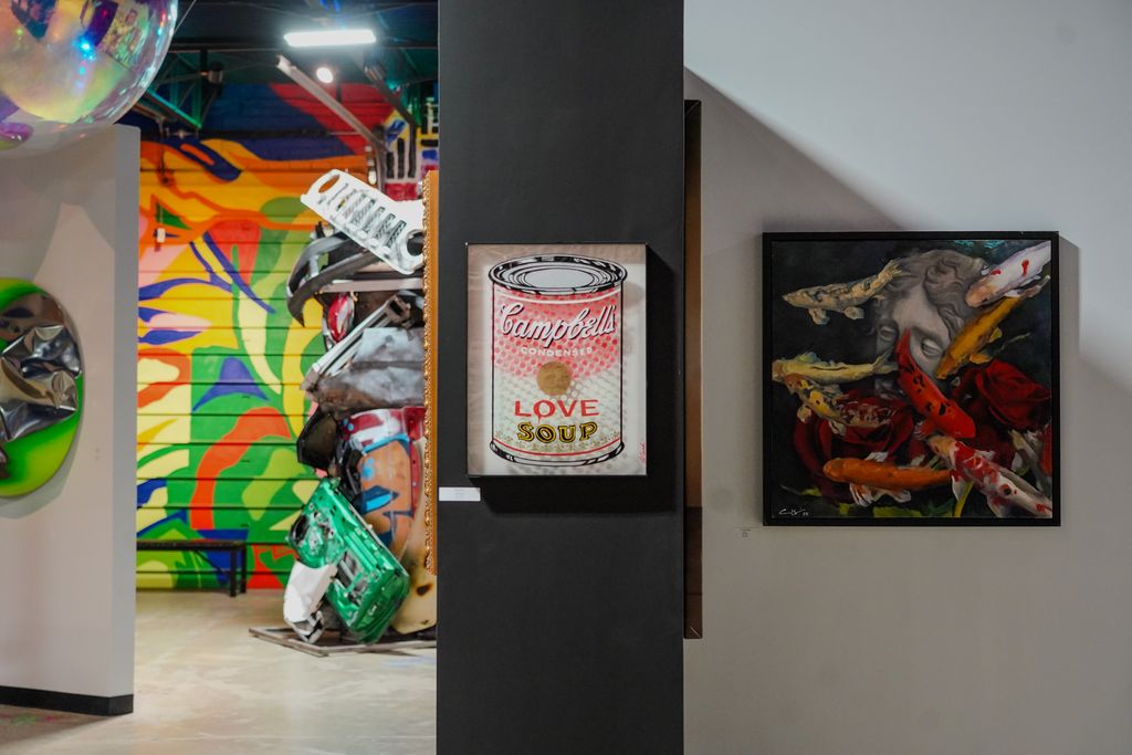 Layered contemporary art and sculpture view inside Gallery DeFi