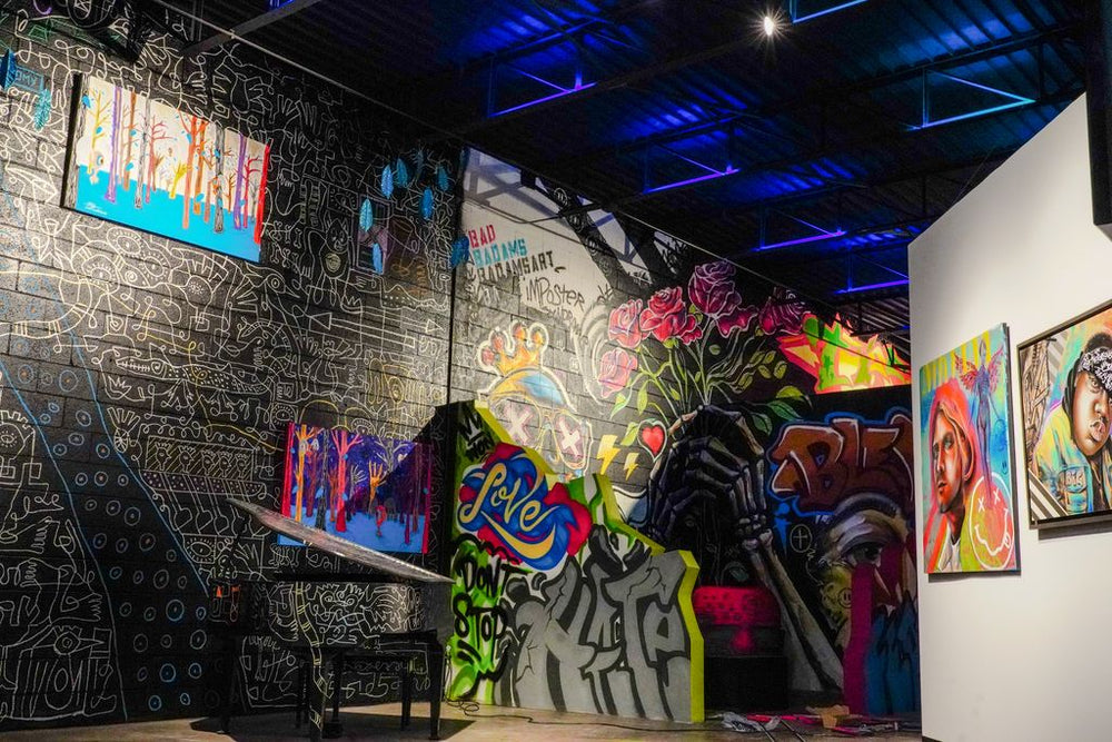 Murals, paintings and a piano inside Gallery DeFi